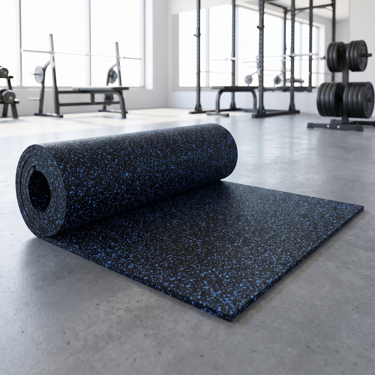 Blue Fleck commercial rubber gym flooring roll, 1m x 10m, partly unrolled on a gym floor