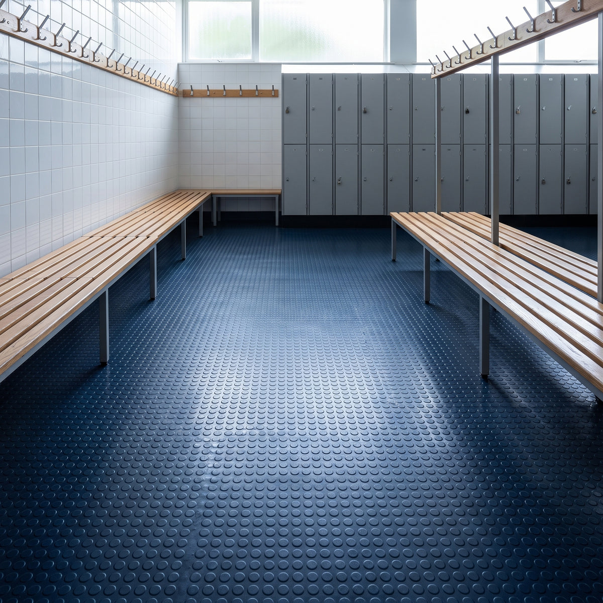 Deep Sea Blue Round Dot Rubber Safety Flooring installed in a real-world setting